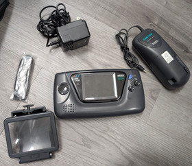 SEGA Game Gear Handheld System With Bag, Battery, Magnifier, And Charger