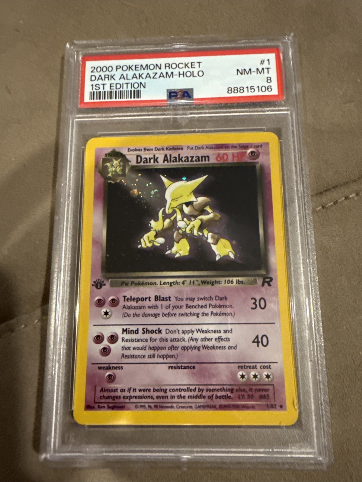 Pokémon Team Rocket Dark Alakazam Holo 1st Edition PSA 8