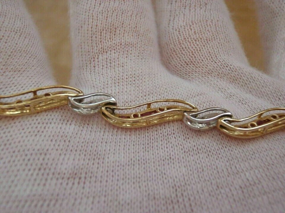 Brazalete Tenis 7.0Ct Corte Redondo Simulado Rubí y Diamante Acabado Oro 14K Dos Tonos Foto 2 de 4