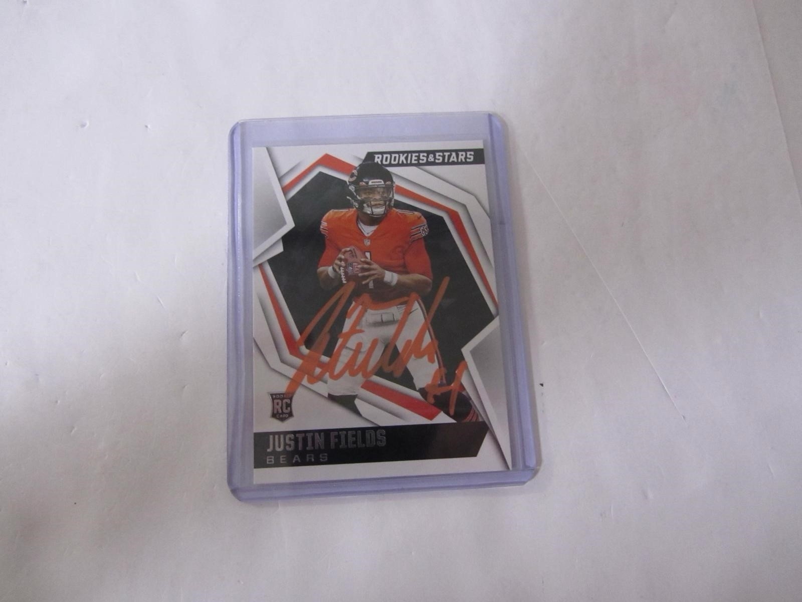2021 Panini Rookies & Stars - Rookies Justin Fields #104 (RC). On Card Auto