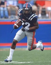 Dexter Mccluster signed NFL football 8x10 photo W/Cert Autographed (A0306