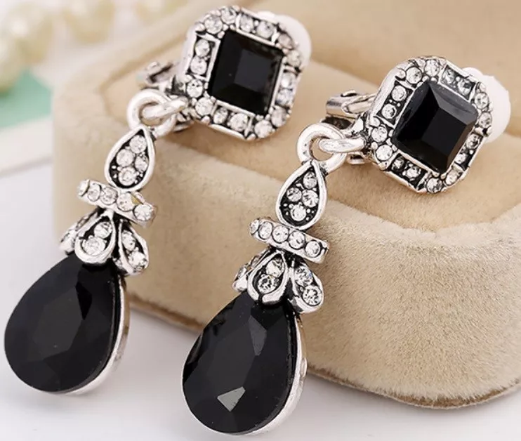 Silver dangle shop clip on earrings