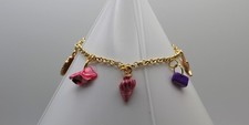 Handcrafted 7.5" gold chain with green, pink, and blue sea life charms bracelet