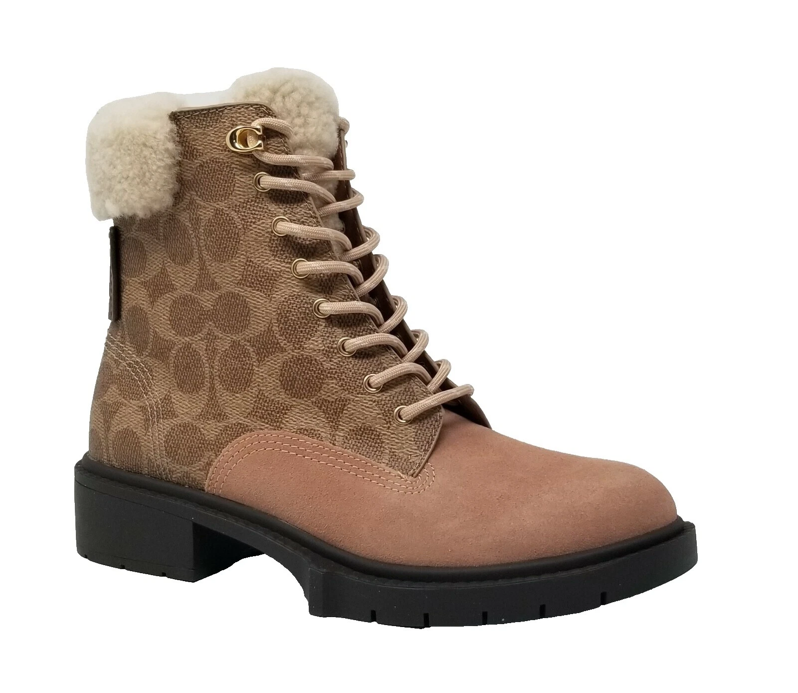 Coach mujer ante marrón