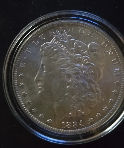 1884-O * CHOICE AU MORGAN SILVER DOLLAR