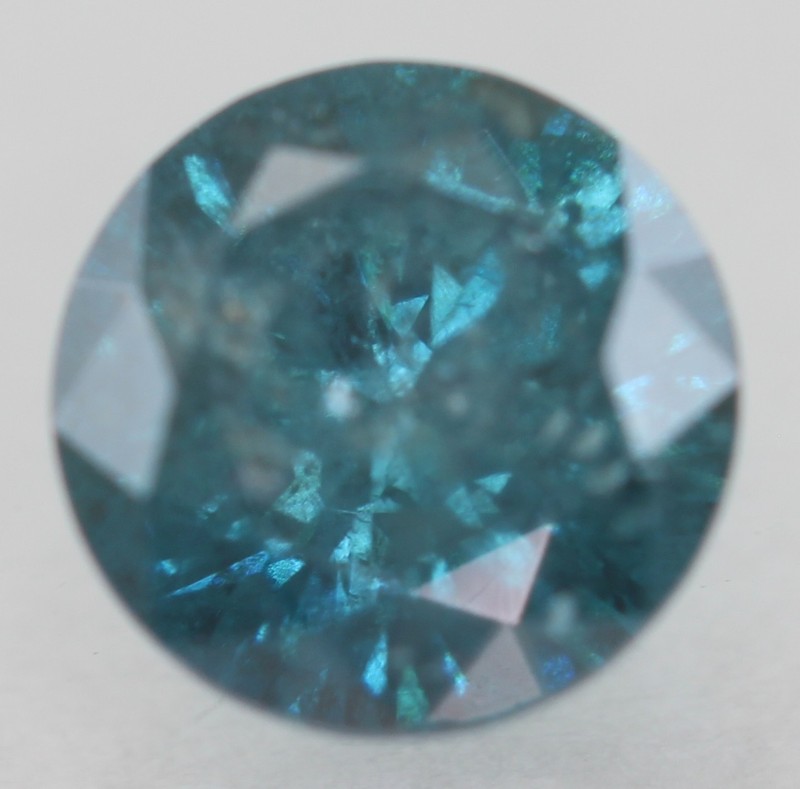 0.69 Carat Vivid Blue Round Brilliant Natural Enhanced Loose Diamond 5.5mm VIDEO