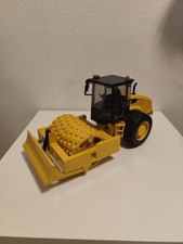 Bruder 02450 Cat Walzenzug mit Planierschild und Stampffußwalze