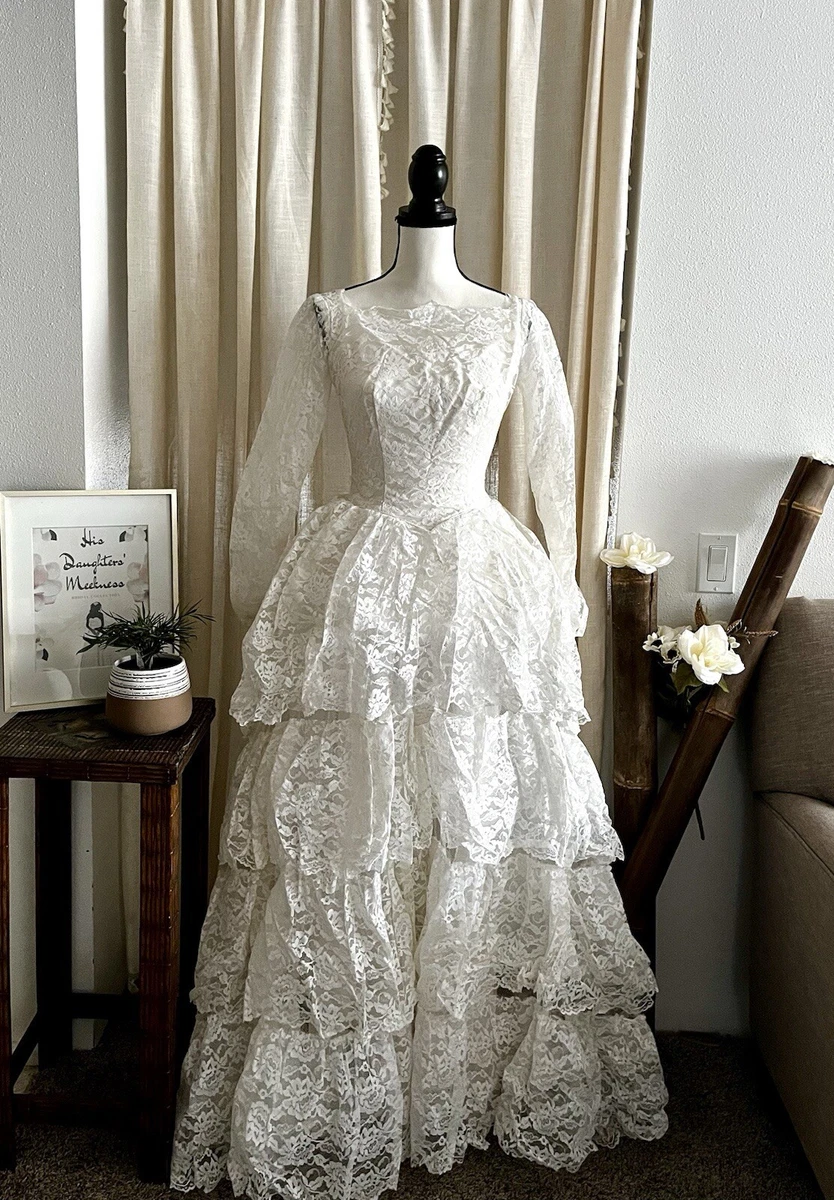 long sleeve tiered wedding dress Long Sleeve Winter Wedding Dresses from Darius Cordell Bridal