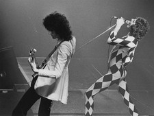 Brian May and Freddie Mercury of Queen perform on stage on their N- Old Photo