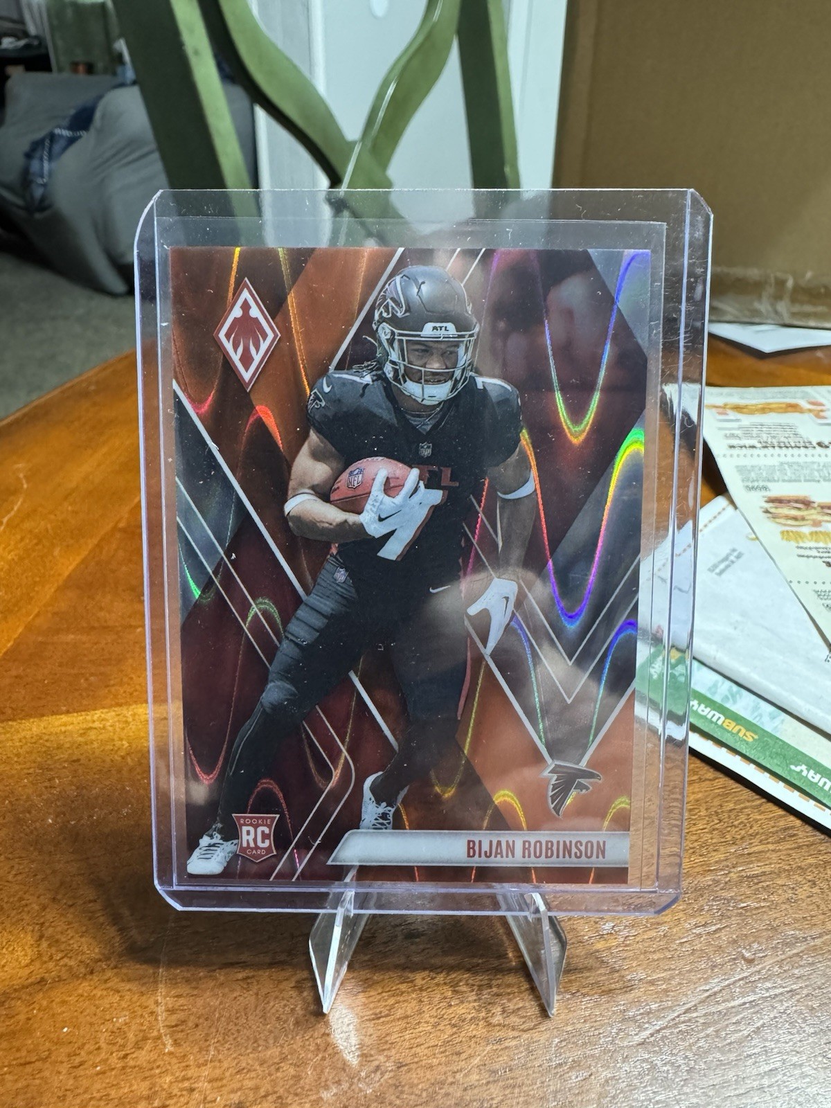 2023 Panini Phoenix Bijan Robinson Rookie Orange Seismic Prizm /99 Falcons #104