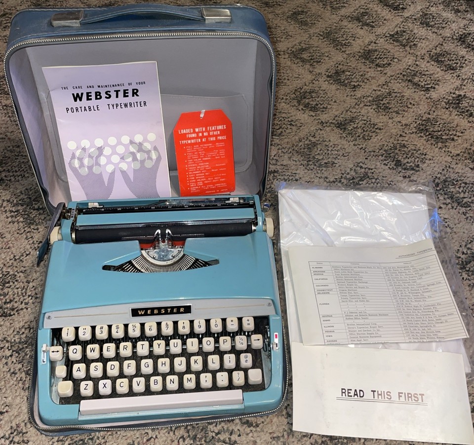 A 1960s Brother Webster portable in lovely blue with its original case AND paperwork — rare survival of the complete package.