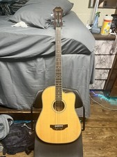acoustic electric bass guitar used