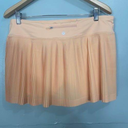 Falda plisada a calle Lululemon tiro medio en verano naranja claro brillante talla 10 - Imagen 4 de 5