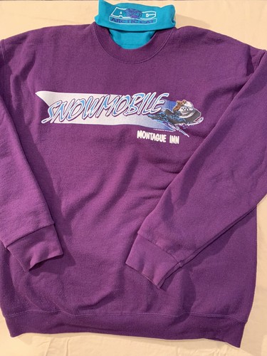 Vintage Purple Arctic Cat Snowmobile 