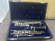Oboe: Fox Model 450. Material: Grenadilla w/ plastic upper joint.