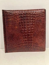 DOS NEIMAN MARCUS ALLIGATOR EMBOSSED LEATHER SLIP IN PHOTO ALBUM, 25PGS.