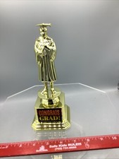 CONGRATS GRAD Trophy Approx. Size 8 1/2 inches x 3 1/2 inches. 52