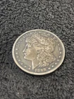1892-O Silver. Toned. Morgan Dollar.