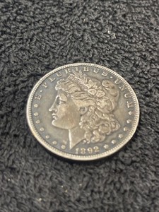 1892-O Silver. Toned. Morgan Dollar.