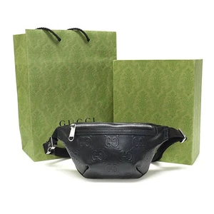 Sac ceinture Gucci noir GG en cuir gaufré 658582 38767819