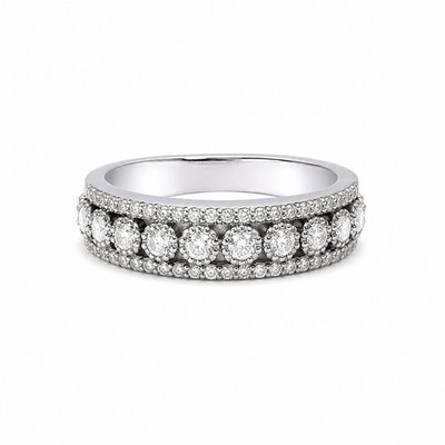 Anillo de oro blanco de 14K (5 g), diseñado con 9 diamantes en línea. 