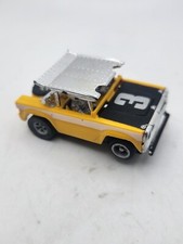 Vintage AURORA AFX Off Road Ford Bronco Baja 3 HO SLOT CAR Yellow Nice RUNS
