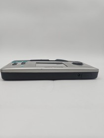 Tiger Game.Com System w/ AC Charger, Batman & Robin game and Lights Out Game