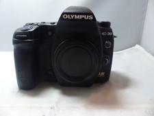 Olympus E -30 12MP. Fully functional and looks great. Body only with body cap.