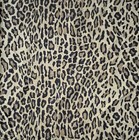 Tan fabric with dark brown and black leopard print pattern, white background, and visible seams.