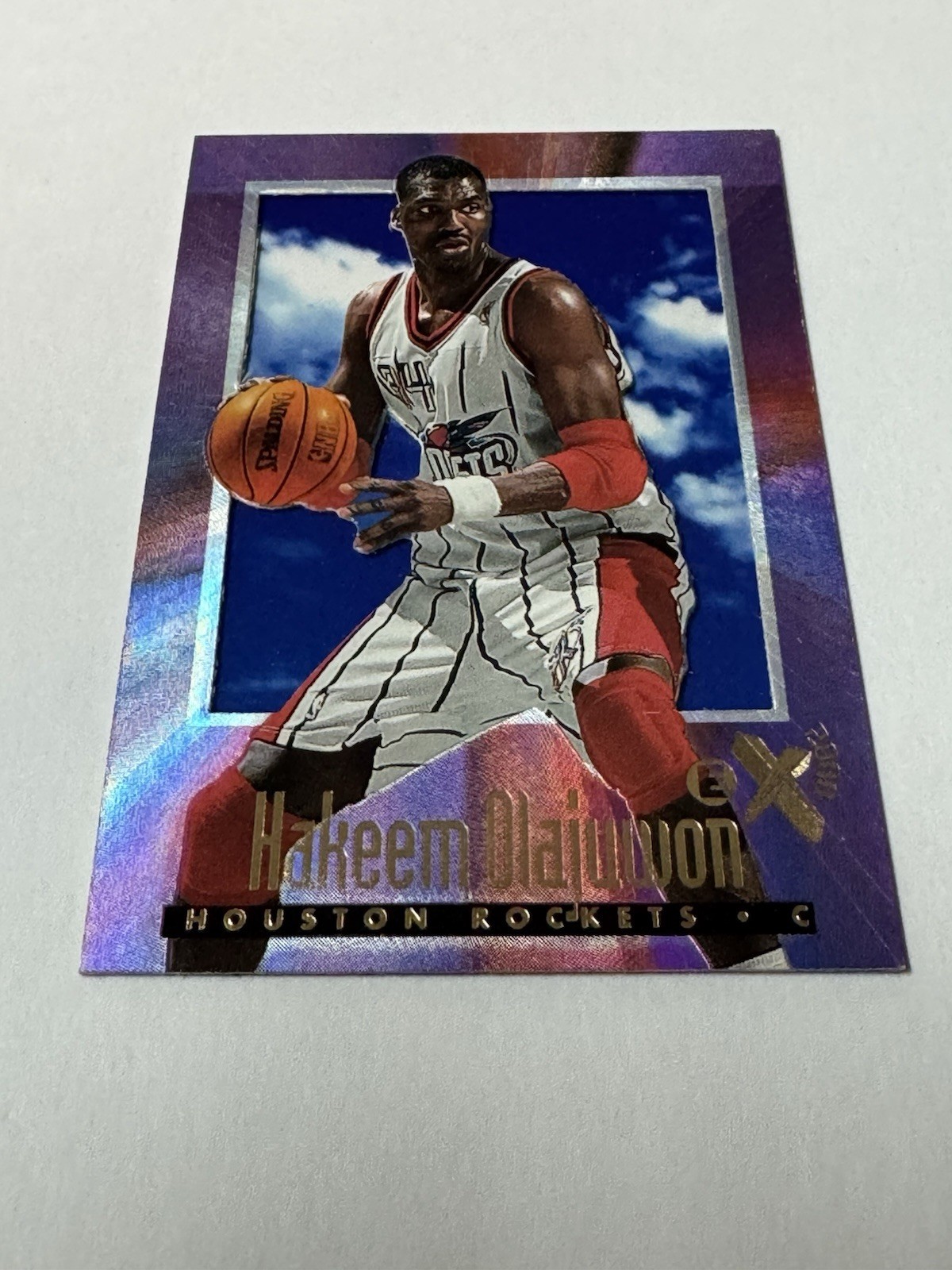 1996-97 Skybox E-X2000 Hakeem Olajuwon #25 Houston Rockets NBA Basketball Card