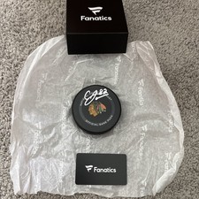 Fanatics COA Caleb Jones Signed Game Puck Chicago Blackhawks NHL Autograph