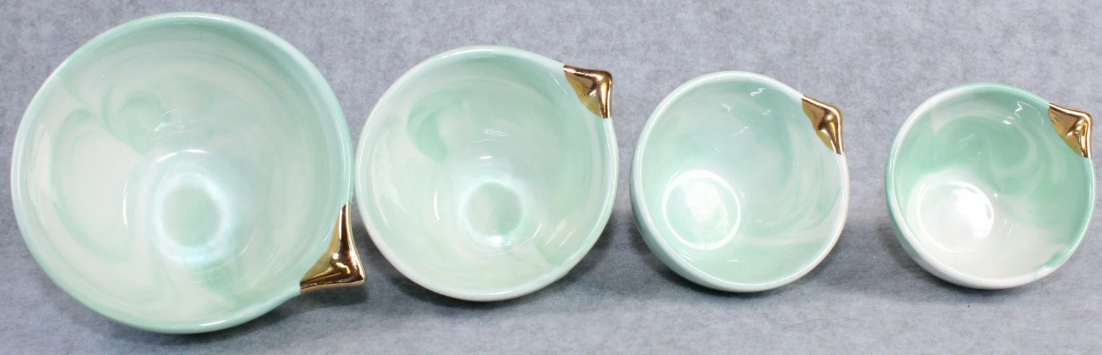 Anthropologie Ceramic Measuring Cups GREEN Set of 4 Gold Swirl Teal
Opens in a new window or tab