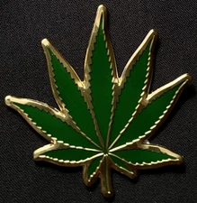 MARIJUANA LEAF METAL STICKER "GOLD N GREEN" 2 1/2 X 2 1/2" PRETTY FRESH LOOKING 