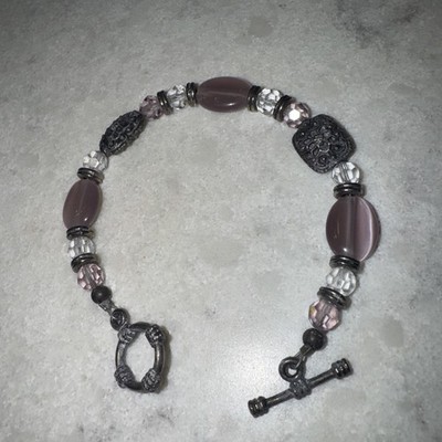 Handmade Purple and clear colored stone 7 inch bracelet.
