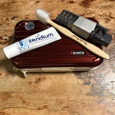 Rimowa First Class Amenity Toiletries Case Metallic Maroon Ivory