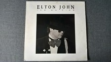 ELTO JOHN - ICE ON FIRE .             LP.