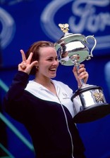 Martina Hingis of Switzerland poses with the trophy after defeatin- Old Photo 2