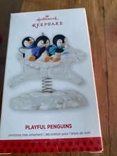 Hallmark Keepsake Ornament 2013 Playful Penguins Riding Reindeer Playground Toy