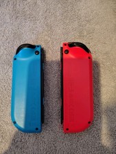 Genuine Nintendo Joy-Con (2512366) Controllers Pair - blue and red GWO..