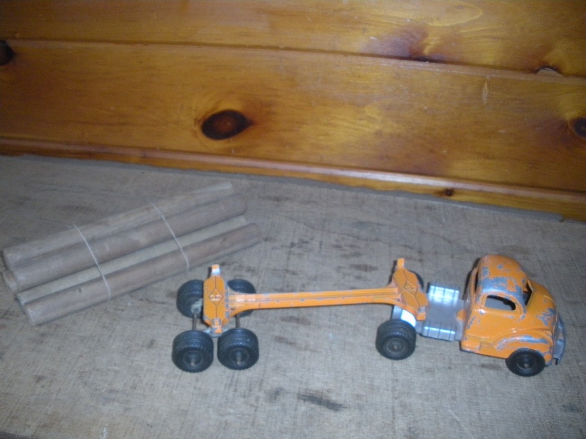 Vintage Hubley 500 Series Logging Truck Tractor Trailer Orange