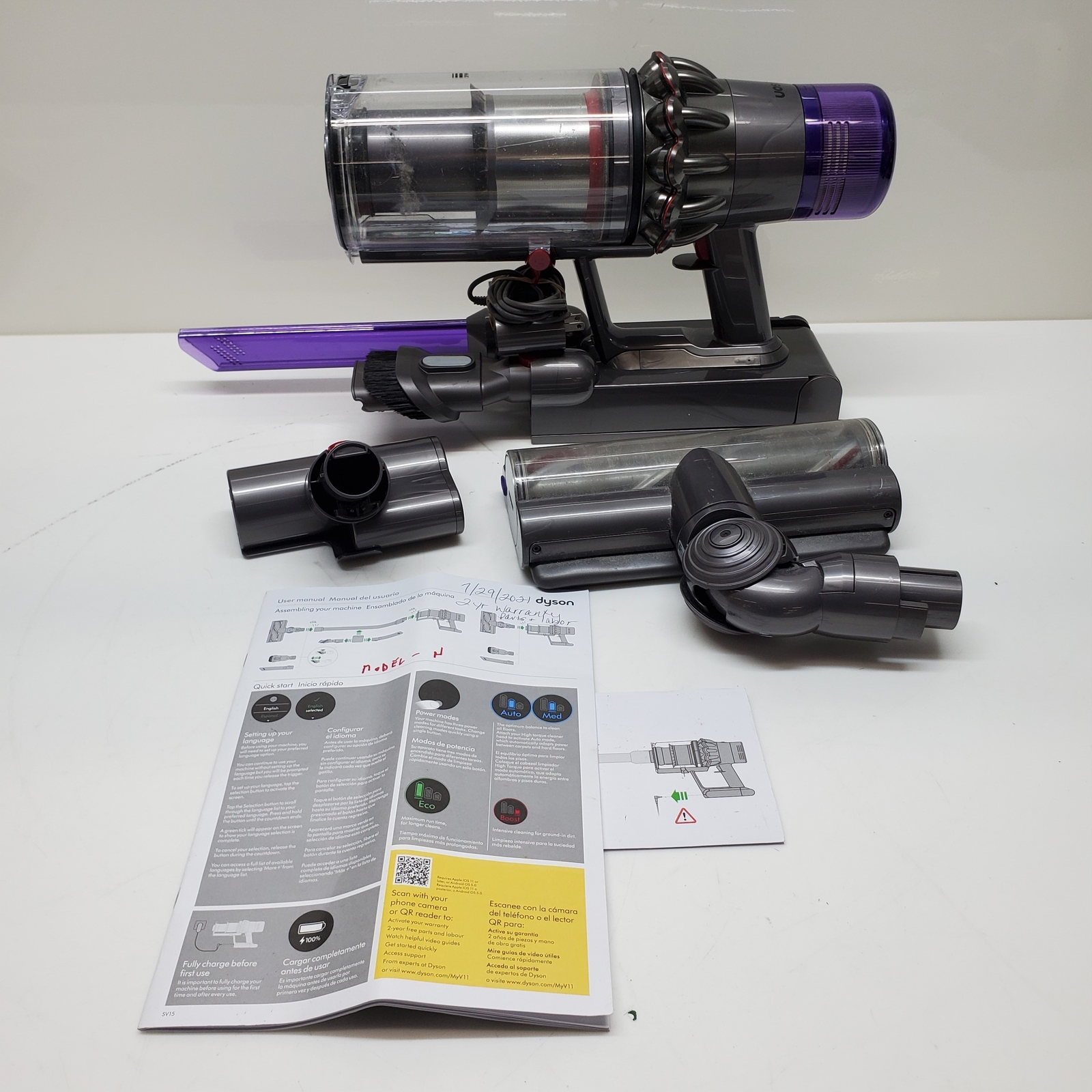 Dyson Hand Vacuum with Attachments and Power Mounting Station Powers ON