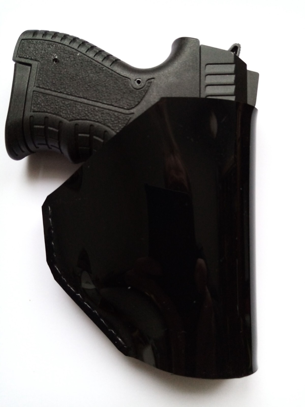 Holster de ceinture rigide pour petite arme de poing avec clip
