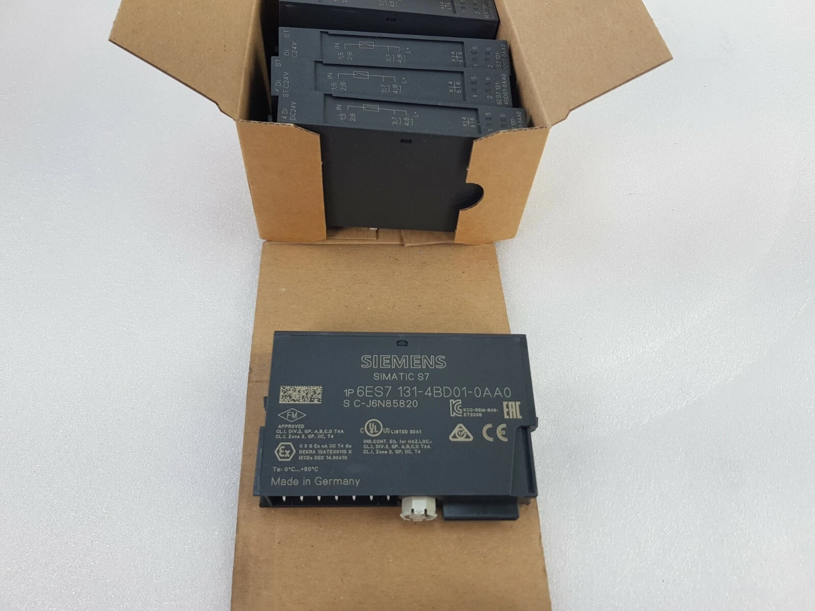 Siemens 6ES7131-4BD01-0AA0 module front label, Made in Germany, with others in the box