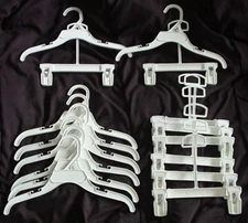 2 PART OUTFIT HANGERS-(8) 12" FOR TOPS WITH (8) ADD ON/BOTTOMS HANGERS-PRE OWNED