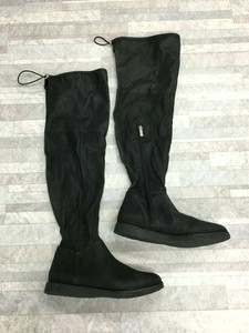 tall over the knee flat boots