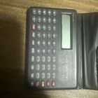 Data Directory Model # 2051 Calculator in Wallet Made In China — photo 1