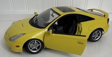AUTOart Toyota Celica Yellow Diecast Car w/ Opening Doors Hood & Trunk 1/18