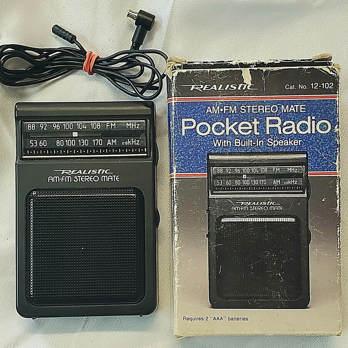 REALISTIC AM/FM STEREO POCKET RADIO 12-102 BOX AND FM