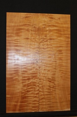 Quilted maple book matched guitar drop top.