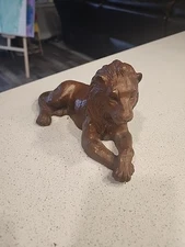 Vintage Brownish Red Lion Reclining Figurine Composite 8.5” Wood Satute Brown